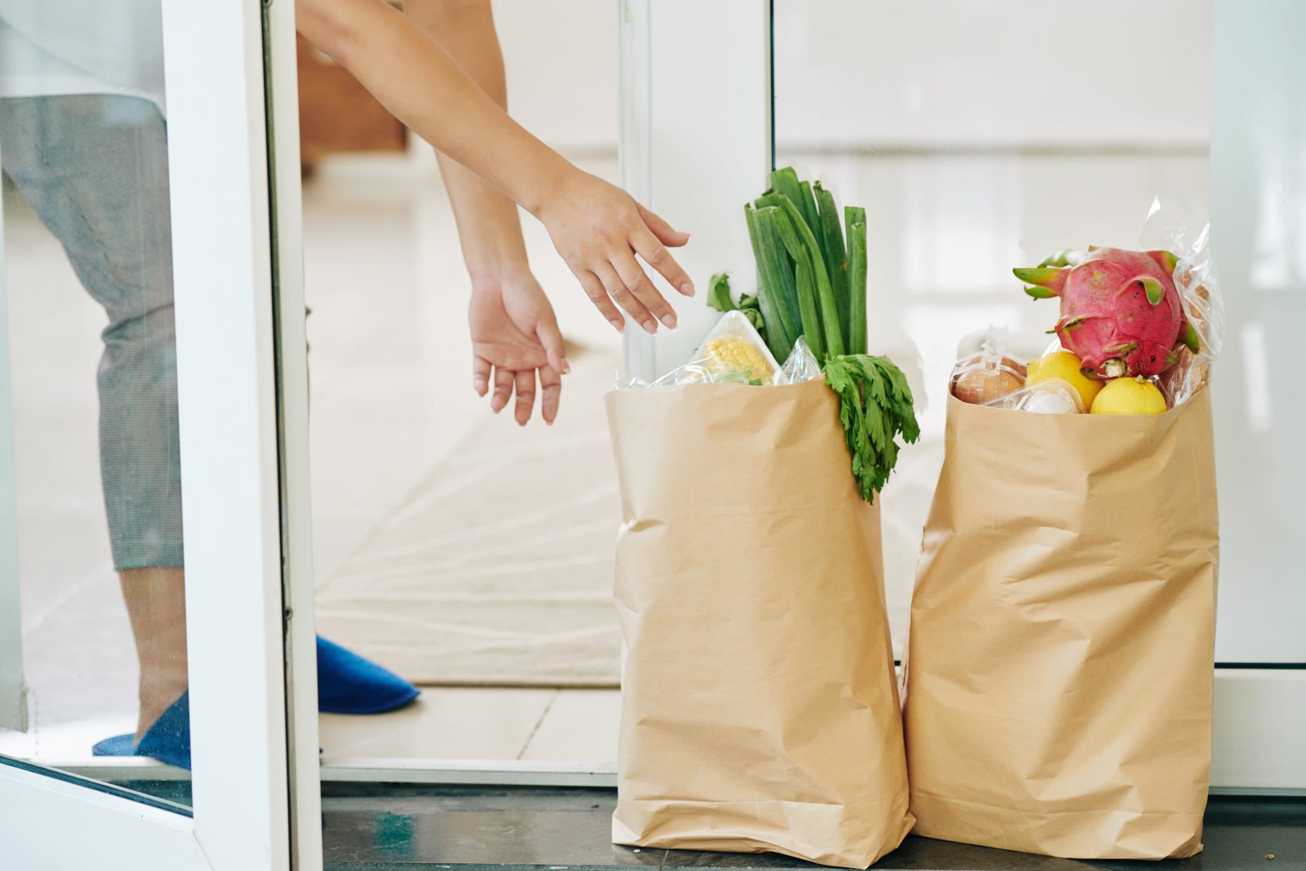 Sanitizing groceries at checkout with UV light
